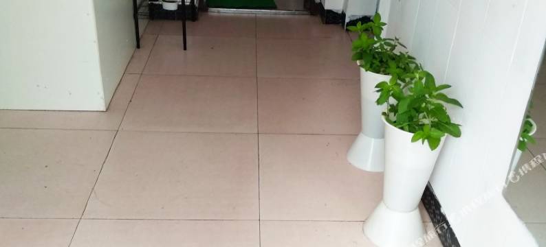 驿旅阳光客栈(武汉纺织大学外经贸学院藏龙岛校区光谷职业学院店)图片