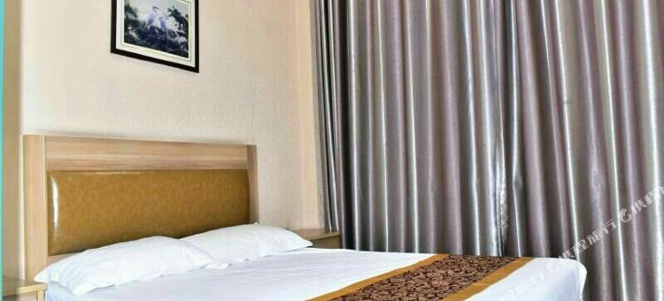 康平佐岸商务宾馆图片