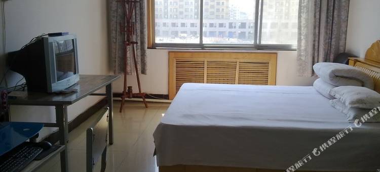 明伟招待所(威海文登新汽车站店)图片