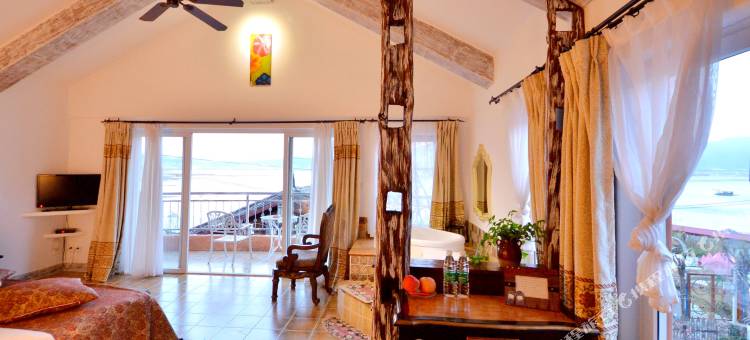 丽江逸人水岸城堡客栈图片