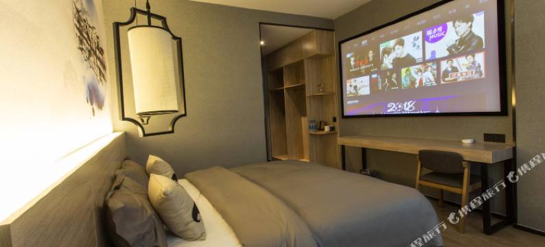 张家港迷白艺术酒店(大成广场店)图片