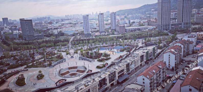 舒恩公寓(烟台万象城店)图片