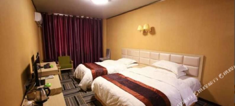 德意商务酒店(黄果树瀑韵天城广场店)图片