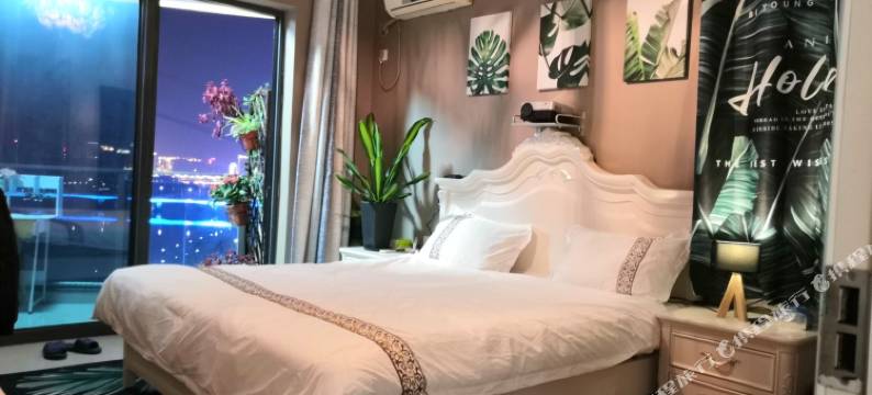 近会展万达灯光秀一线江景房公寓(江边洲路分店)图片