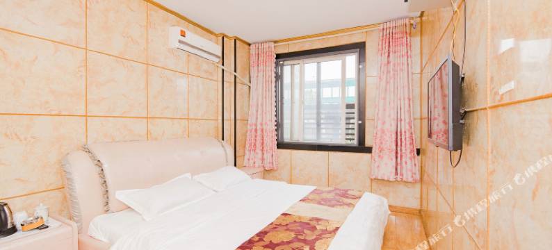 南京彭玉华精品宾馆(东南大学成贤学院泰山新村地铁站店)图片