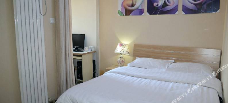 憨豆酒店公寓(郑州正弘数码公寓店)图片