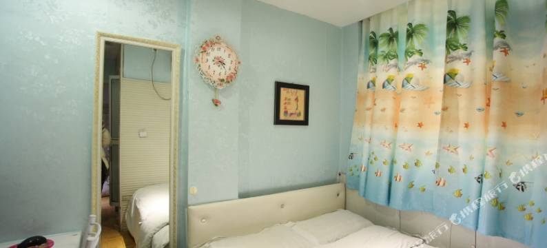 锦州樱花雨晴旅馆图片