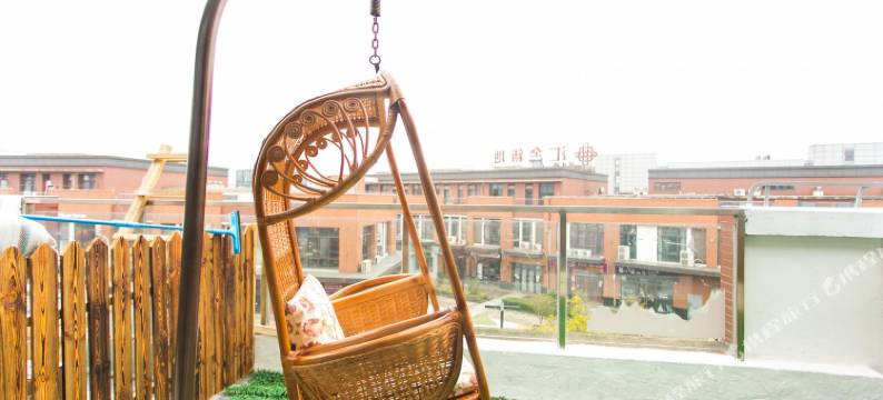 苏州圆石小歇主题宾馆(苏州科技大学石湖校区店)图片