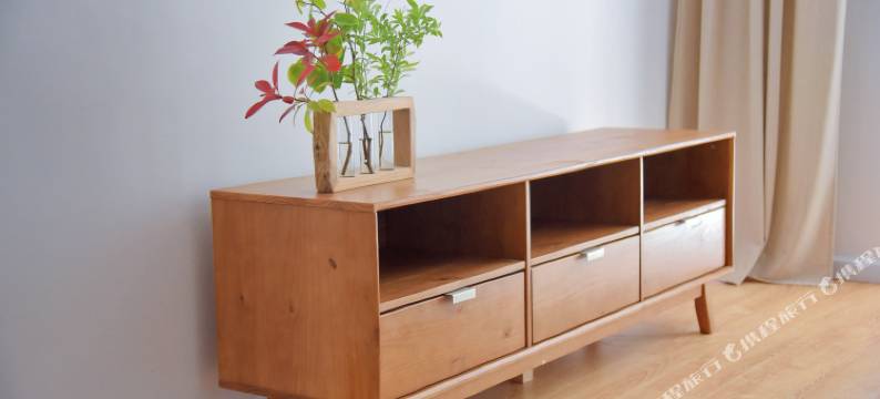 青岛化羽成蝶公寓图片