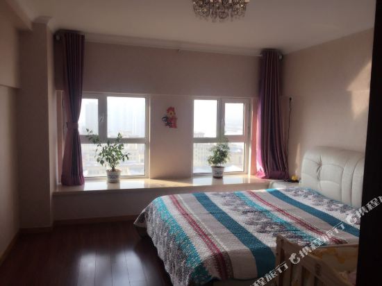 包头共享假日公寓(昆河景观公园分店)