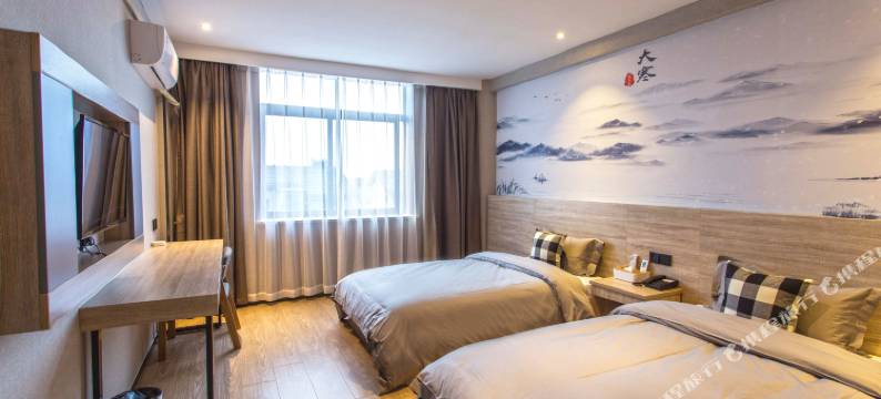 张家港迷白艺术酒店(大成广场店)图片