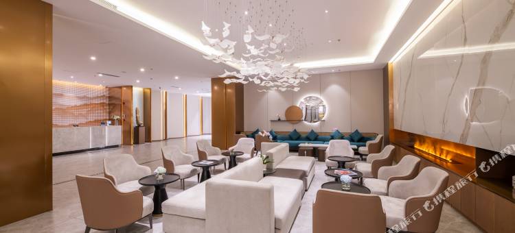 青岛崂山区石老人海水浴场桔子水晶酒店图片