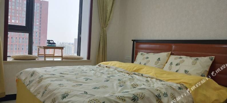 花开盛夏的温馨小家公寓(咸阳2号店)图片