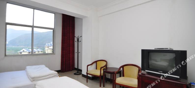 新平嘎洒精工大酒店图片