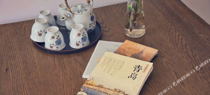 青岛化羽成蝶公寓图片