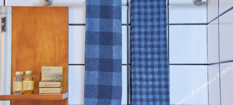 青岛化羽成蝶公寓图片