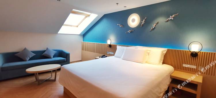 青岛崂山区石老人海水浴场桔子水晶酒店图片