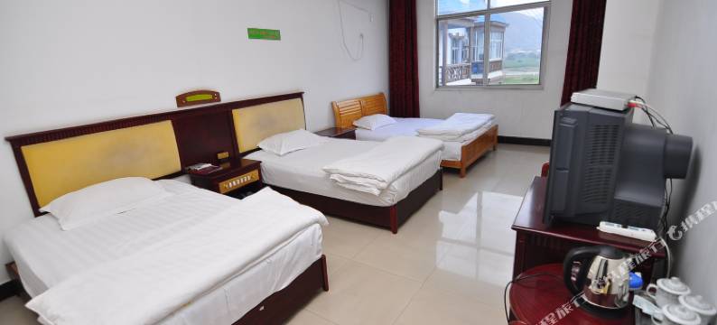 新平嘎洒精工大酒店图片