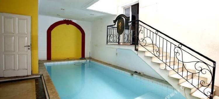 贡图尔拉亚塞蒂亚布迪红多兹Plus酒店(RedDoorz Plus @ Guntur Raya Setiabudi)图片