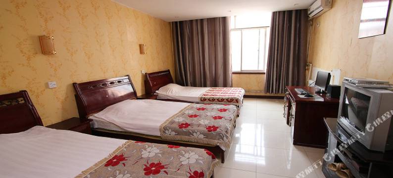 嘉祥天信宾馆图片