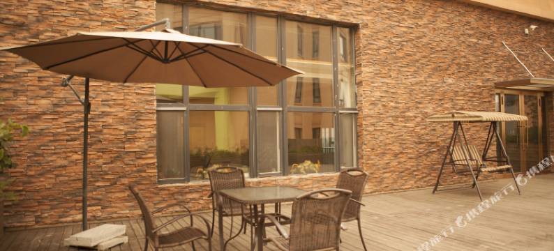 自安然酒店(冰雪大世界世茂大道地铁站店)图片