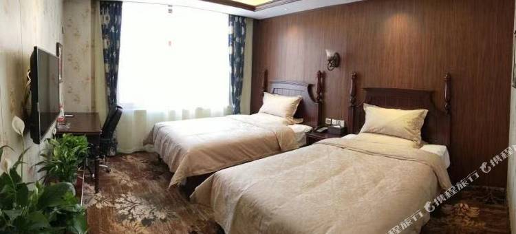 德惠怡美小镇假日酒店(住邦城市广场店)图片