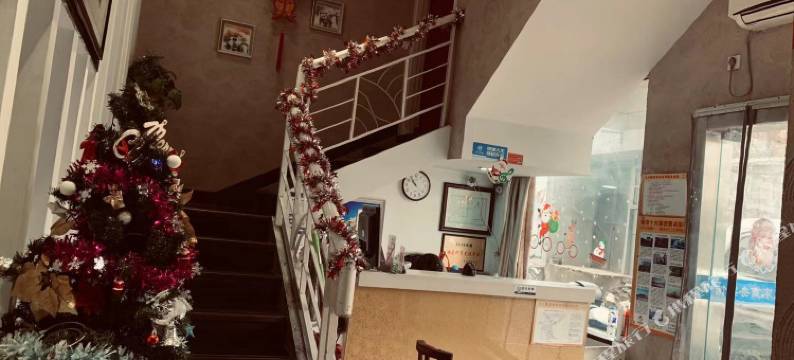 九九聚家商务宾馆(南京站红山动物园店)图片