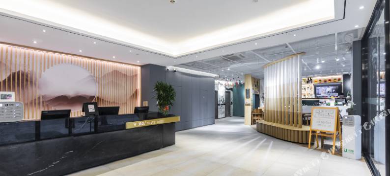 V酒店(广州天河客运站华南理工大学店)图片