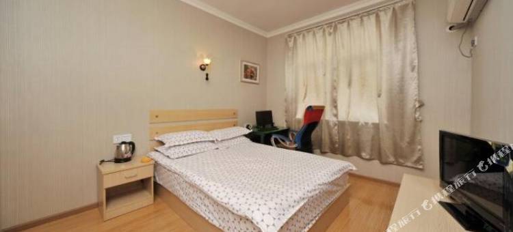 四海一家民宿(武汉商贸职业学院富士康科技园店)图片