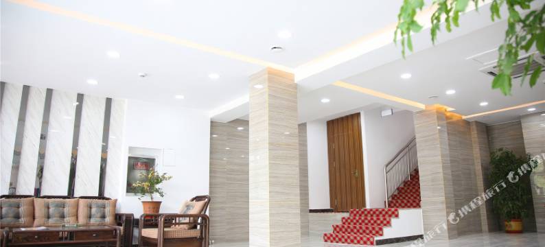 万华晟居宾馆(蓬莱新汽车站店)图片