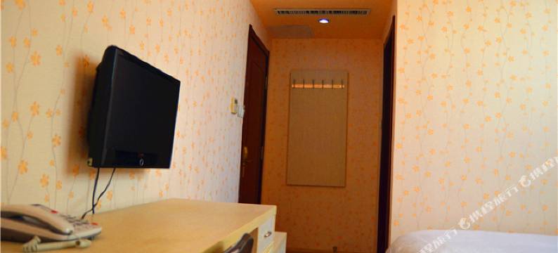 爱客100连锁宾馆(青岛流亭商务区二店)图片