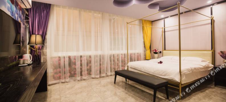 爱客100主题酒店(李村地铁站万达广场店)图片