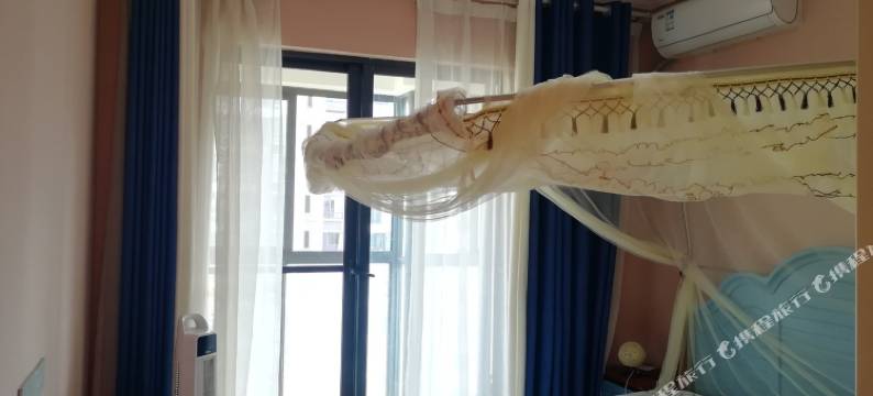 临近海交通便捷房公寓(海口长滨五路店)图片