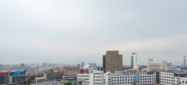 懒虫酒店(许昌曹魏古城胖东来生活广场店)图片