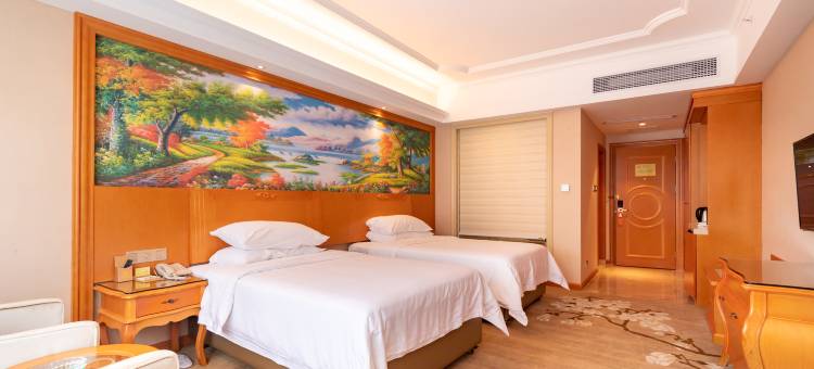 维也纳酒店(始兴店)图片