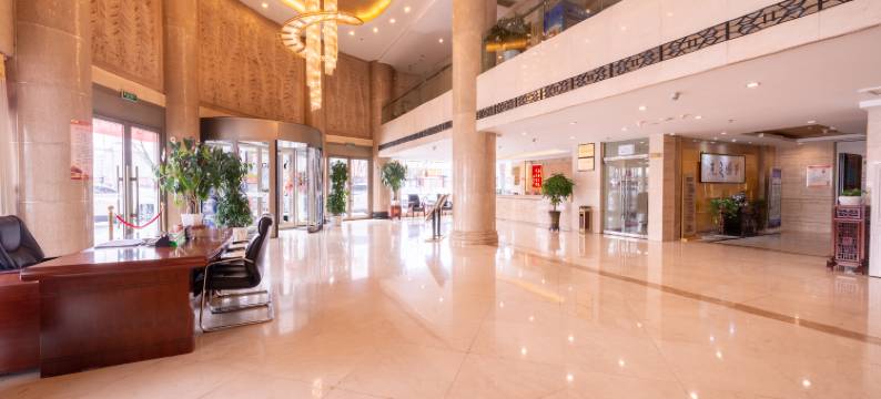 万国名园商务酒店(榆林火车站榆星广场店)图片