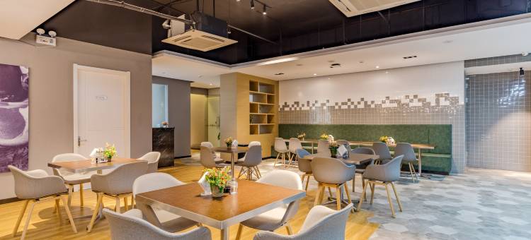 都市花园连锁酒店(池州职业学院秀山门千年古城楼店)图片