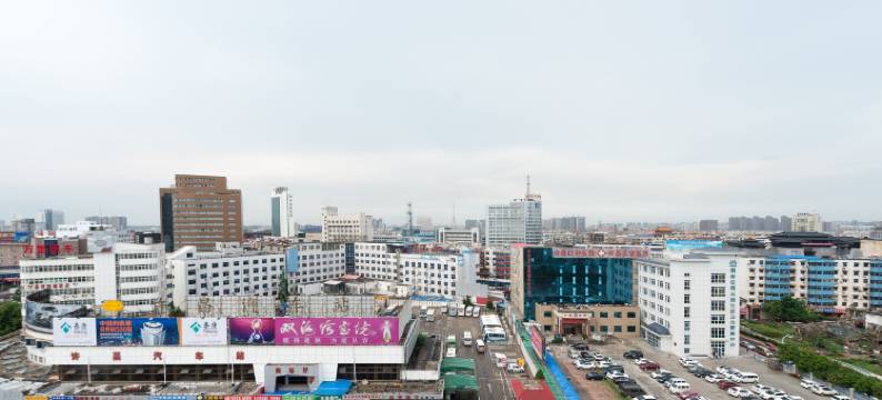 懒虫酒店(许昌曹魏古城胖东来生活广场店)图片