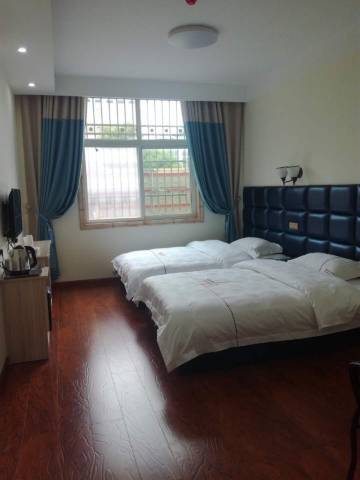 光山圣尊商务宾馆