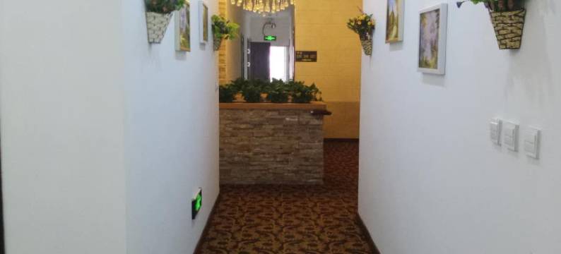 新民吉每宾馆图片