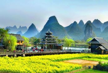 阳朔世外桃源半日游【阳朔酒店上门接送+游船休闲游】【置身一幅古桥、流水、田园、老村与水上民族村寨融为一体的绝妙画中】