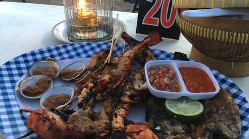 巴厘岛金巴兰海滩Baliku Laut Café落日海鲜餐