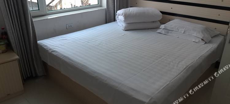 辉南新家快捷宾馆图片