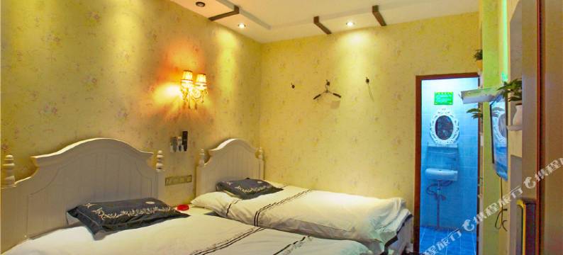 西昌柒贤客栈(湿地公园店)图片