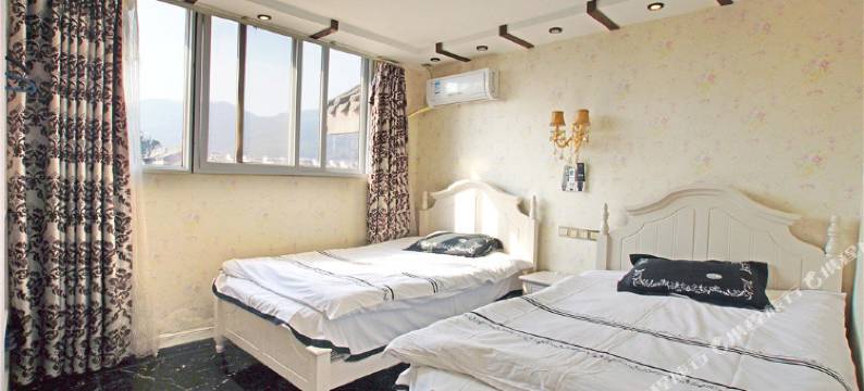 西昌柒贤客栈(湿地公园店)图片