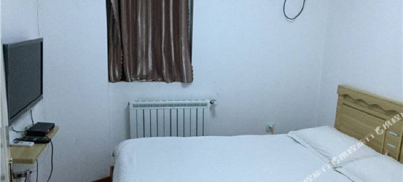 青岛家暖宾馆图片