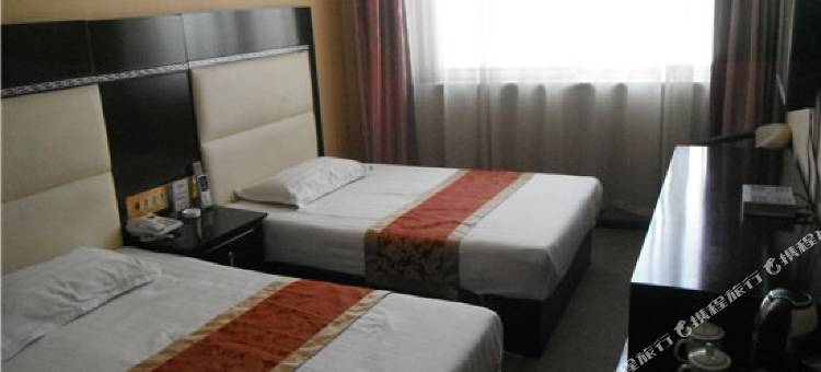 河曲鸣三省商务酒店图片