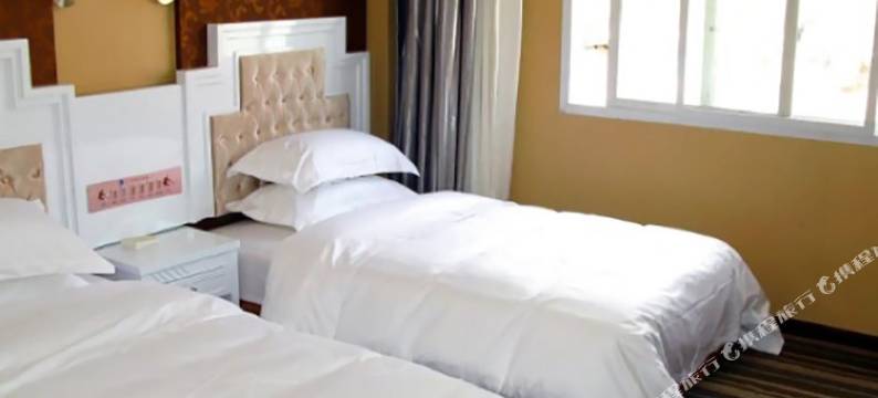 乡城南索大酒店图片