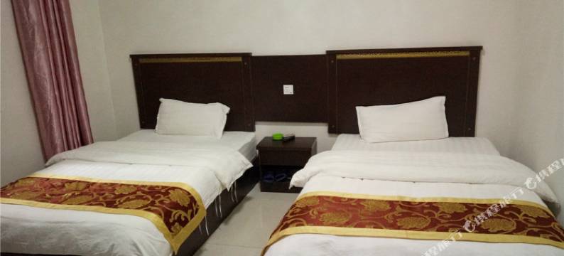 龙华商务宾馆(蒙自市人民医院店)图片