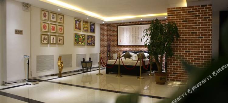 曼卡金苹果酒店(费县东方购物广场店)图片